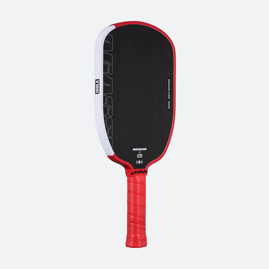 White background, product image of the Agassi x JOOLA Pro Pickleball paddle, red handle, black surface.