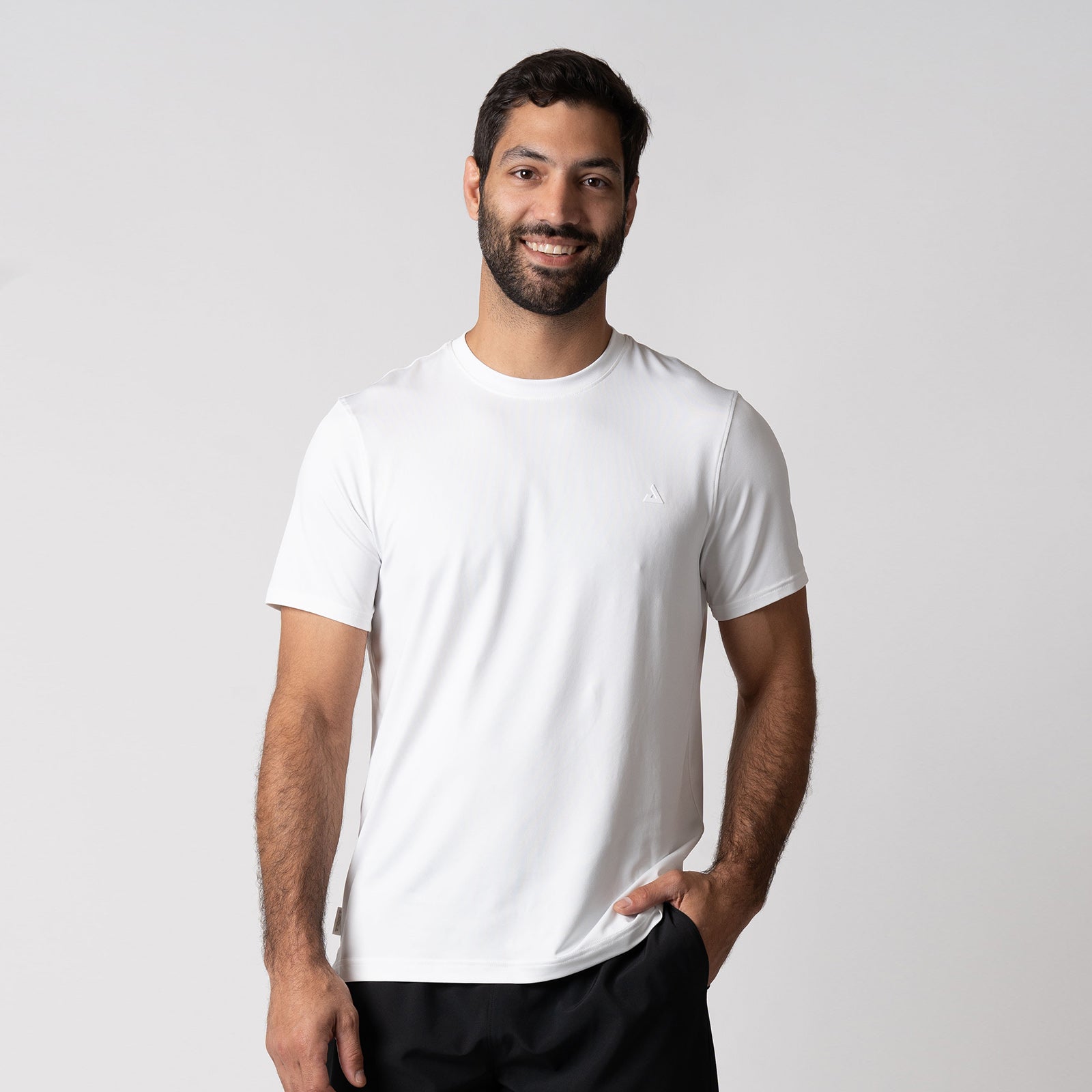 Image of a male model wearing a JOOLA Men's Club Short Sleeve Shirt, White.