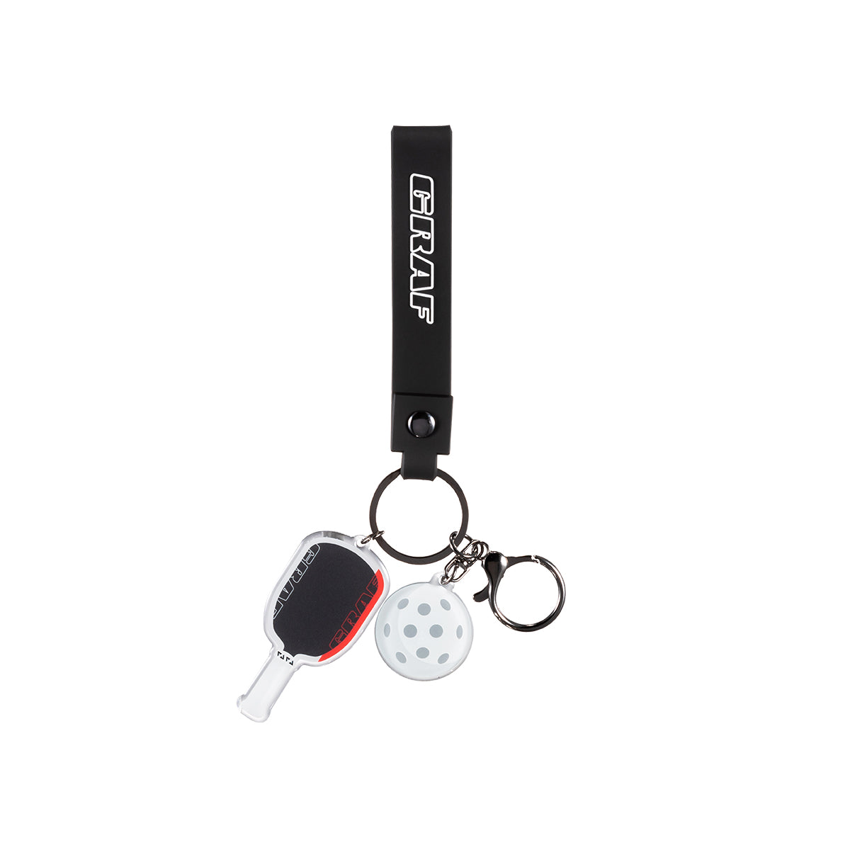 Graf keychain with paddle and white ball charm on a white background