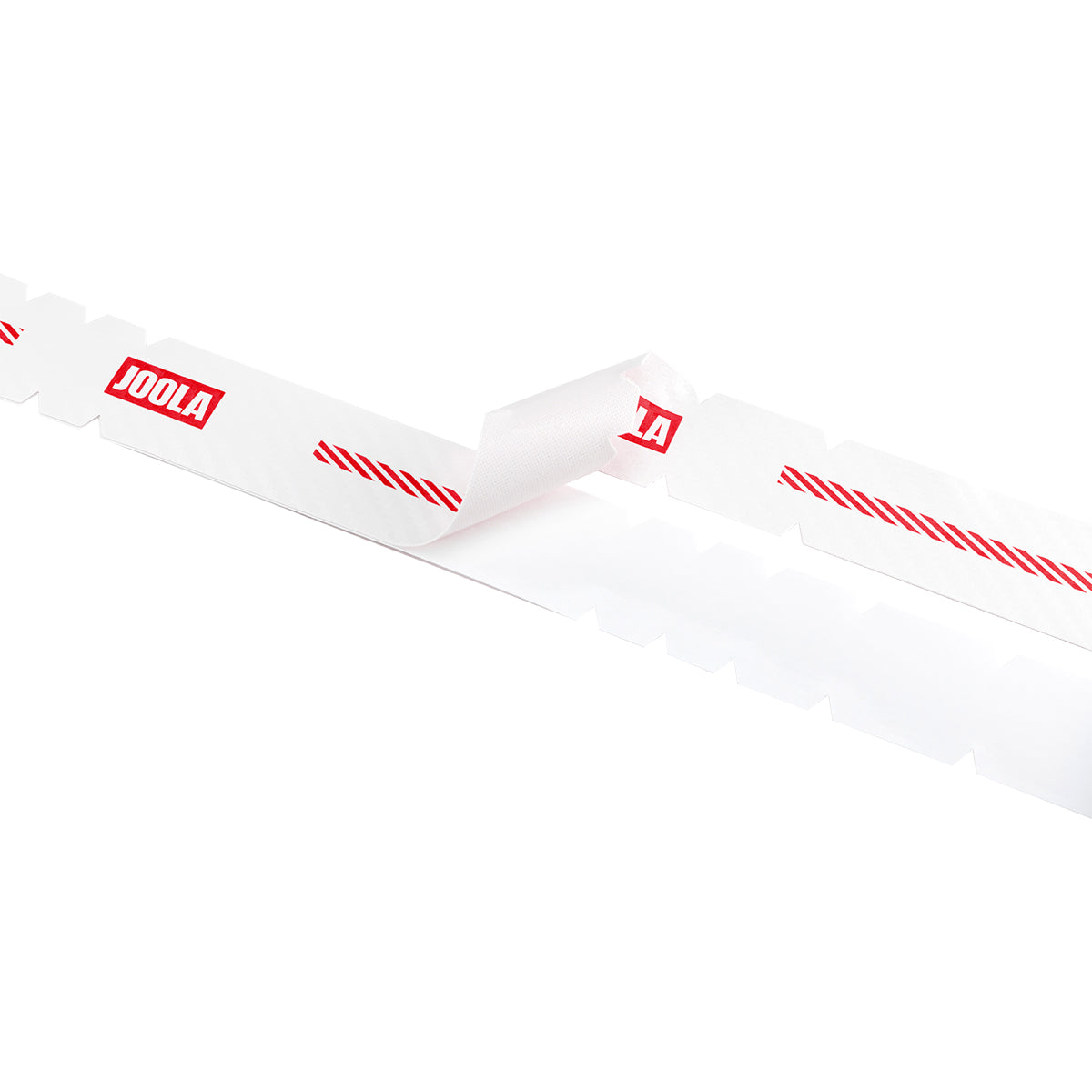 White background, close up image of an unrolled roll of JOOLA Pro IV edge guard tape.