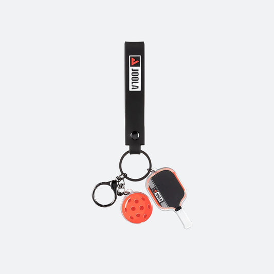 Scorpeus pro IV keychain with paddle and ball charms and Joola logo on a white background.